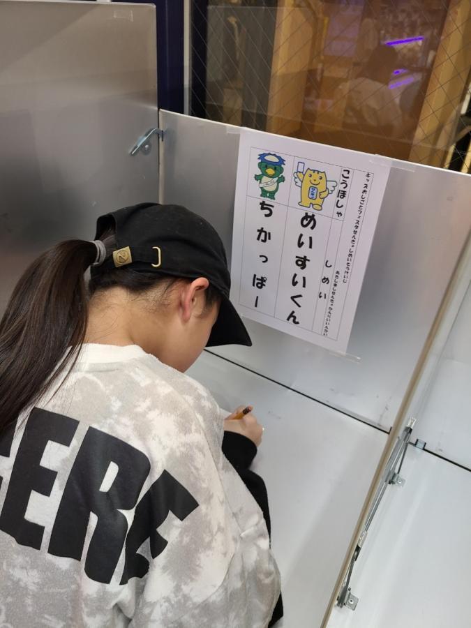 写真:投票しているかた1