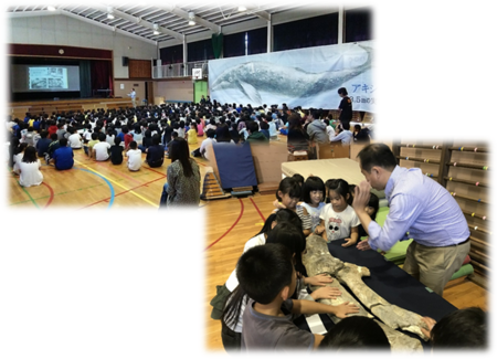 写真：成隣小学校くじら横断幕掲示のようす